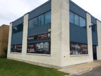 Regimbal Store Front  Building sign box reface and perforated window film installation